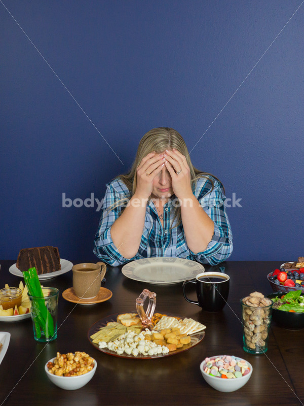 Royalty Free Stock Photo for Intuitive Eating: Plus Size Woman Overwhelmed by Variety of Foods on Dining Table - Body Liberation Photos