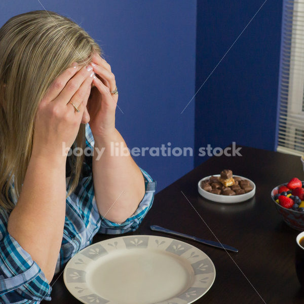 Royalty Free Stock Photo for Intuitive Eating: Plus Size Woman Overwhelmed by Variety of Foods on Dining Table - Body Liberation Photos