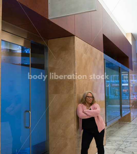 Small Business Stock Image: Black LGBT Businesswoman with Vacant Storefront - Body Liberation Photos