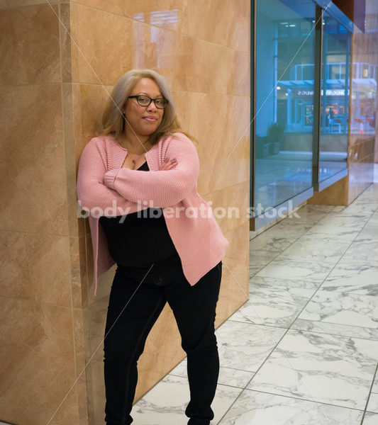 Small Business Stock Image: Black LGBT Businesswoman with Vacant Storefront - Body Liberation Photos