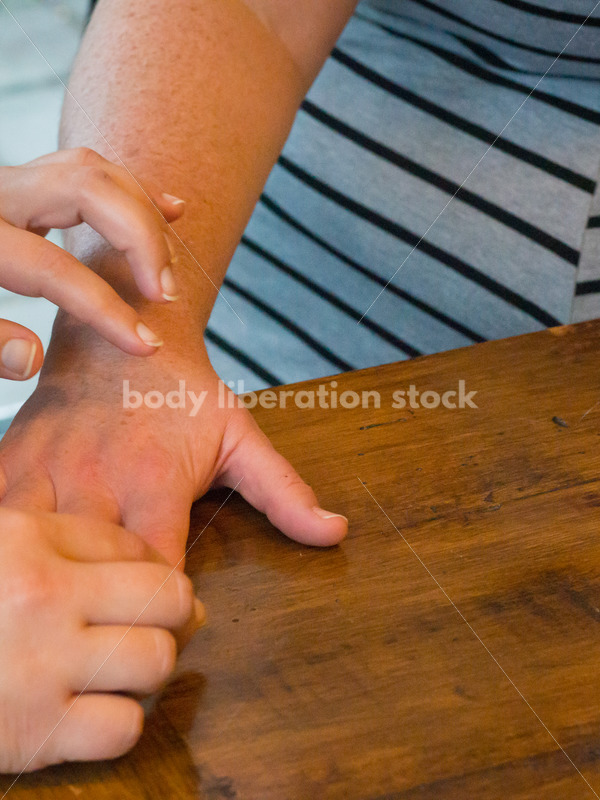 Stock Photo: Acupuncture Student Palpates to Locate Large Intestine Acupuncture Points - Body Liberation Photos
