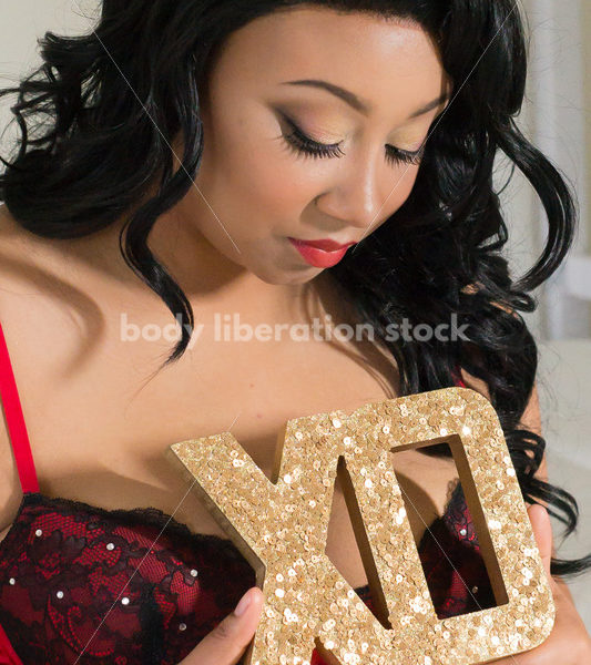 Stock Photo: Close-up of African American Woman with Romantic XO Valentine’s Day Sign - Body Liberation Photos