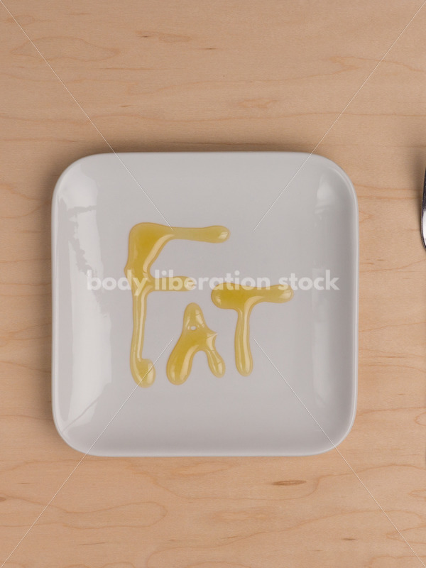 Stock Photo: Diet Recovery Concept FAT Spelled Out on Plate - Body Liberation Photos