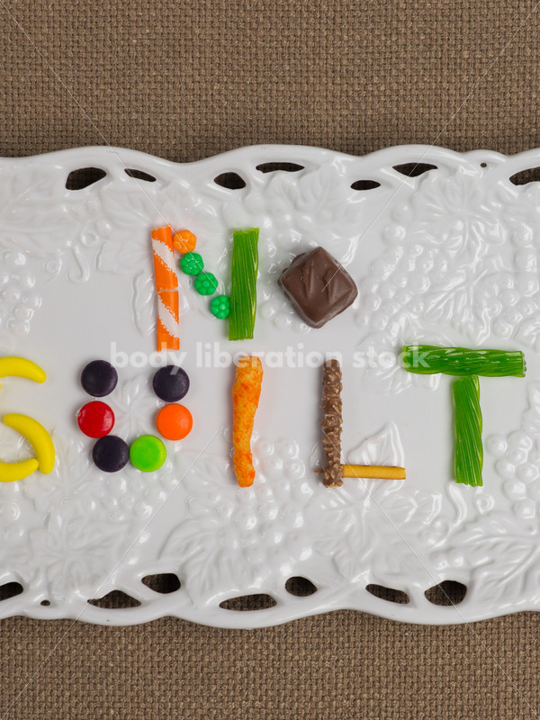 Stock Photo: Diet Recovery Concept NO GUILT Spelled Out in Candy - Body Liberation Photos