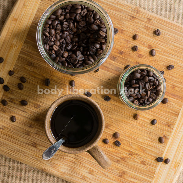 Stock Photo: Hawaiian Coffee Beans and Coffee on Bamboo Cutting Board - Body Liberation Photos