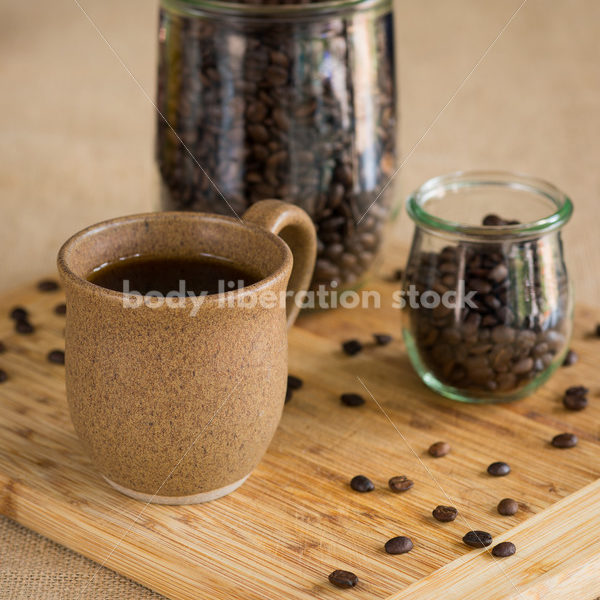 Stock Photo: Hawaiian Coffee Beans and Coffee on Bamboo Cutting Board - Body Liberation Photos