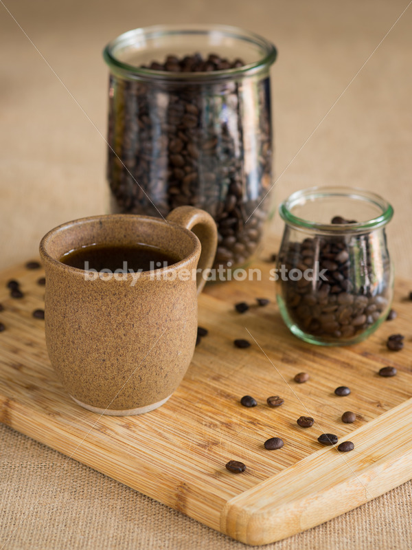 Stock Photo: Hawaiian Coffee Beans and Coffee on Bamboo Cutting Board - Body Liberation Photos
