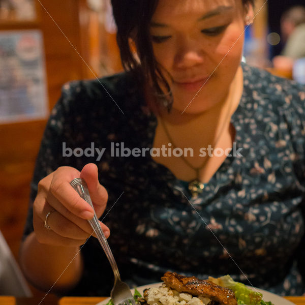 Stock Photo: Intuitive Eating – Asian American Woman with Food - Body Liberation Photos