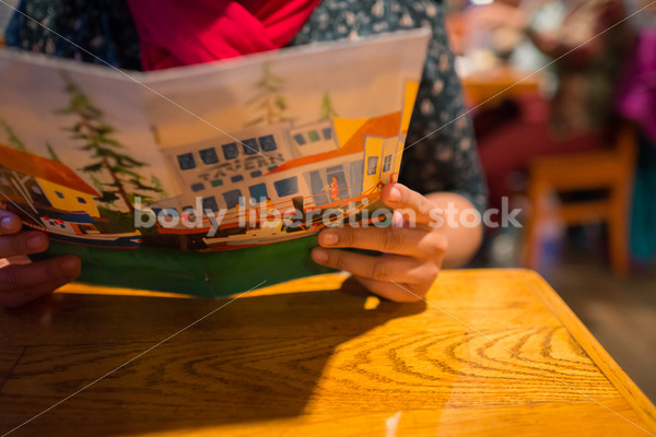 Stock Photo: Intuitive Eating – Asian American Woman with Menu - Body Liberation Photos