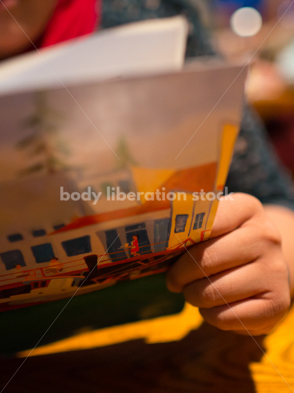 Stock Photo: Intuitive Eating – Asian American Woman with Menu - Body Liberation Photos