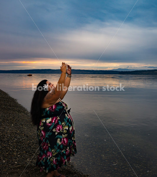 Stock Photo: Joyful Movement Pacific Islander Woman Hula Dancing on Beach at Sunset - Body Liberation Photos