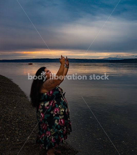 Stock Photo: Joyful Movement Pacific Islander Woman Hula Dancing on Beach at Sunset - Body Liberation Photos