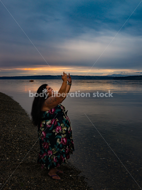 Stock Photo: Joyful Movement Pacific Islander Woman Hula Dancing on Beach at Sunset - Body Liberation Photos