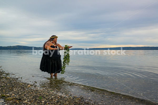 Stock Photo: Joyful Movement Pacific Islander Woman Hula Dancing on Beach at Twilight - Body Liberation Photos