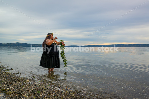 Stock Photo: Joyful Movement Pacific Islander Woman Hula Dancing on Beach at Twilight - Body Liberation Photos