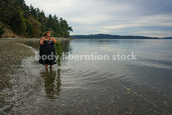 Stock Photo: Joyful Movement Pacific Islander Woman Hula Dancing on Beach at Twilight - Body Liberation Photos