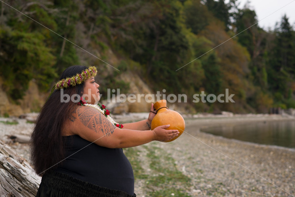 Stock Photo: Pacific Islander Woman Hula Dancing on Evening Pebbled Beach - Body Liberation Photos