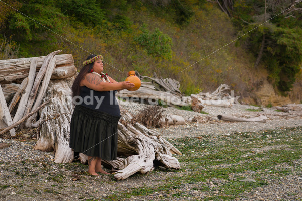 Stock Photo: Pacific Islander Woman Hula Dancing on Evening Pebbled Beach - Body Liberation Photos