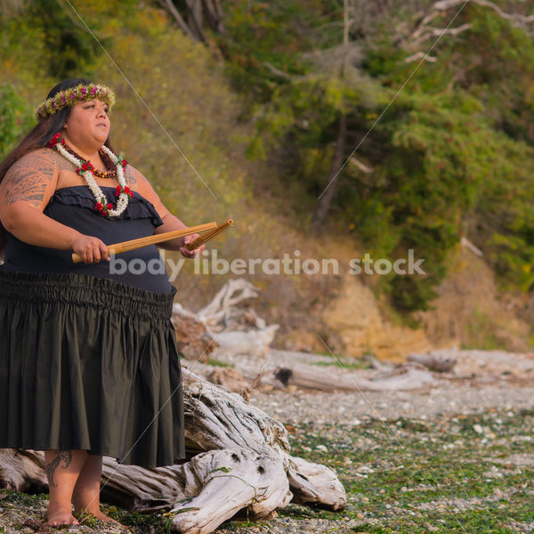 Stock Photo: Pacific Islander Woman Hula Dancing on Evening Pebbled Beach - Body Liberation Photos