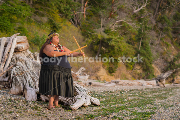 Stock Photo: Pacific Islander Woman Hula Dancing on Evening Pebbled Beach - Body Liberation Photos