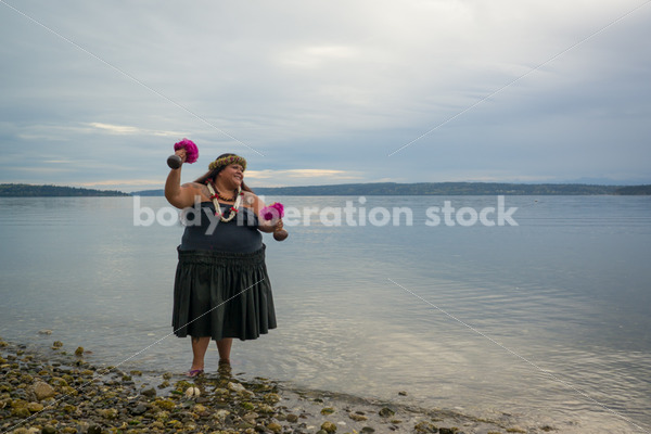 Stock Photo: Pacific Islander Woman Hula Dancing on Evening Pebbled Beach - Body Liberation Photos