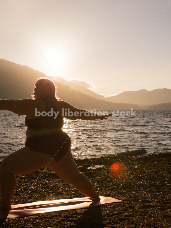 Stock Photo: Plus Size Woman Practices Yoga on Mountain Lake Shore at Sunset - Body positive stock and client photography + more | Seattle
