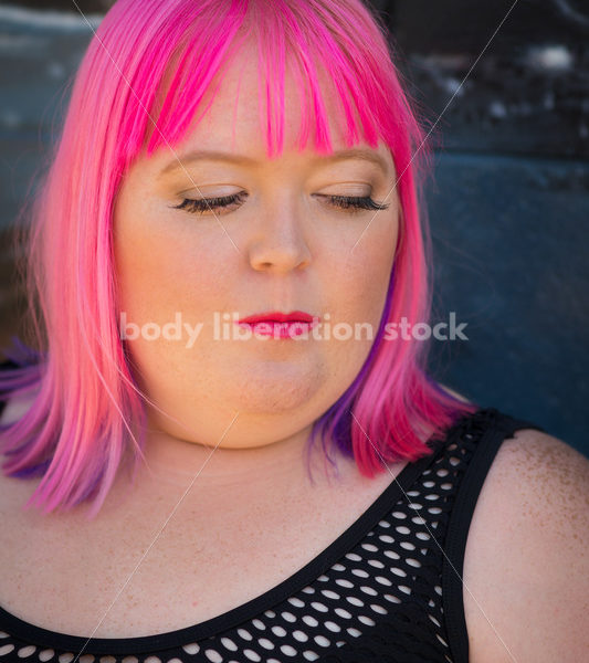 Stock Photo: Plus Size Woman with Pink Hair Seated in Tutu with Mural - Body Liberation Photos