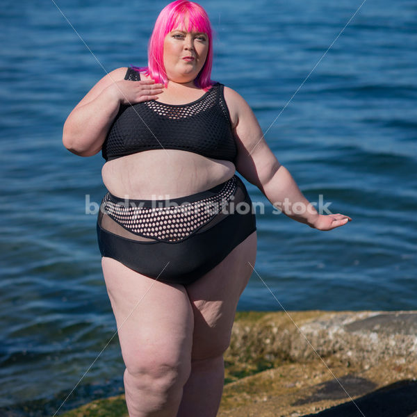 Stock Photo: Plus Size Woman with Pink Hair in Bikini near Water - Body Liberation Photos