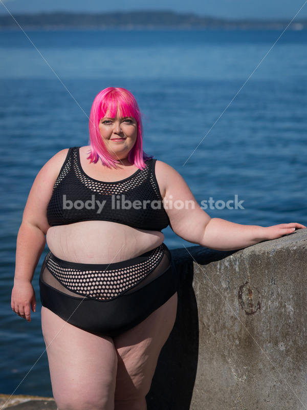 Stock Photo: Plus Size Woman with Pink Hair in Bikini near Water - Body Liberation Photos