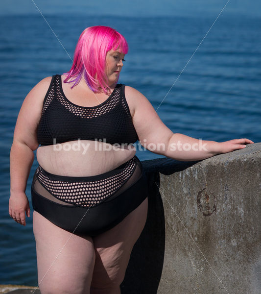 Stock Photo: Plus Size Woman with Pink Hair in Bikini near Water - Body Liberation Photos