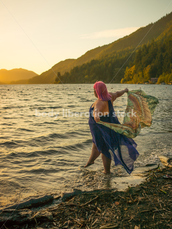 Stock Photo: Plus Size Woman with Scarf on Sunset Lake Shore - Body Liberation Photos