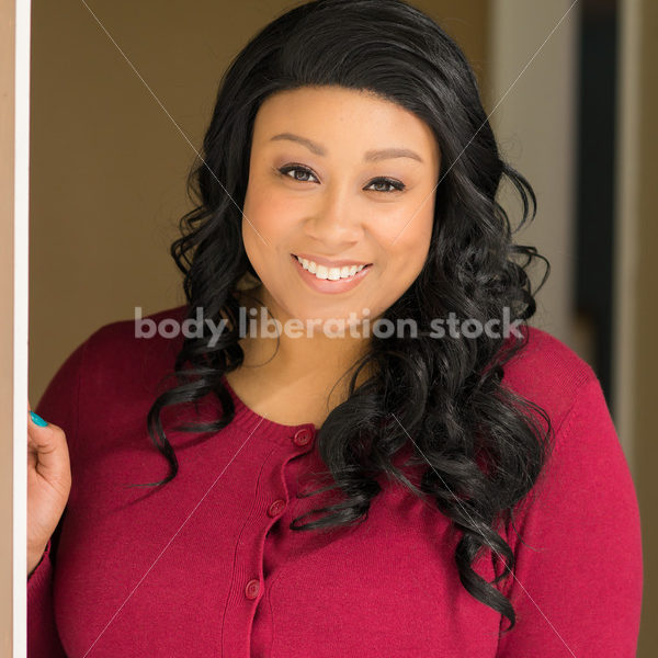 Stock Photo: Young African American Woman in Doorway - Body Liberation Photos