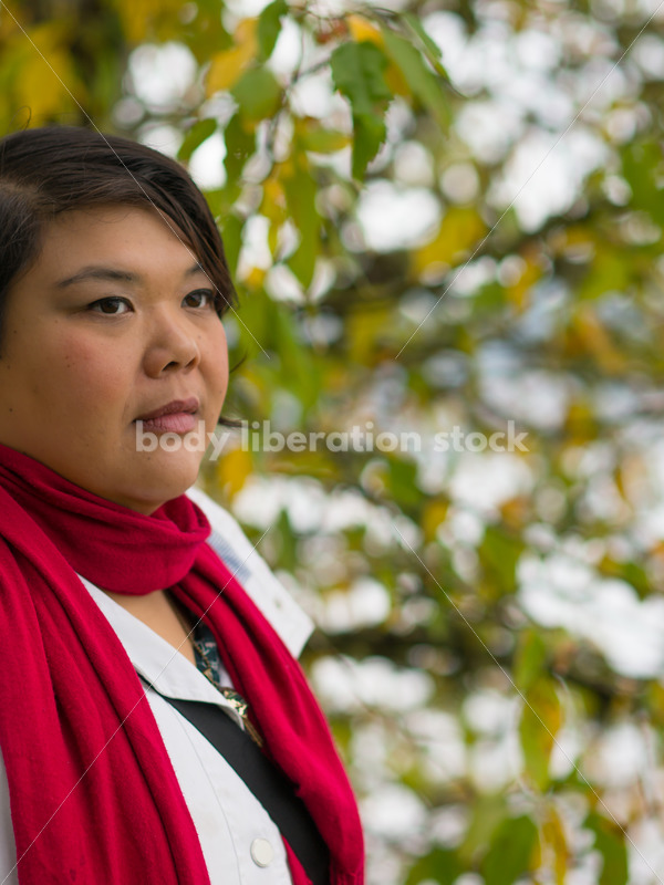 Stock Photo: Young Asian American Woman with Tree Branches - Body Liberation Photos
