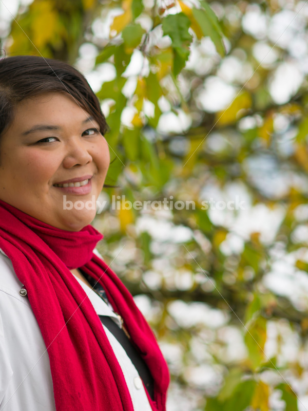Stock Photo: Young Asian American Woman with Tree Branches - Body Liberation Photos