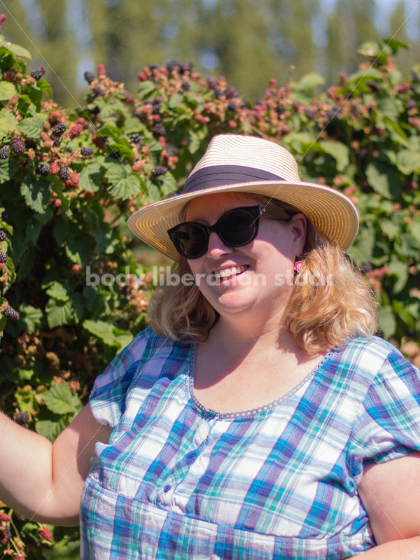 Agriculture Stock Image: Fat Woman Picking Berries - Body Liberation Photos