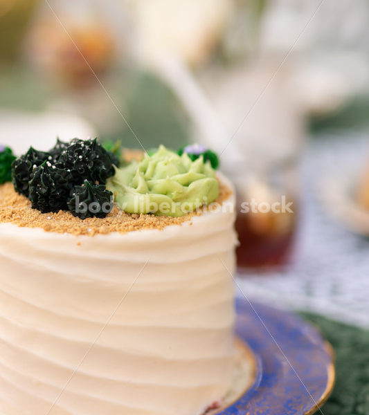 Close-up of Decorated Cake on Tea Party Table - Body Liberation Photos