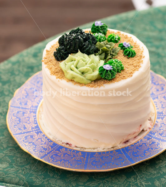 Close-up of Decorated Cake on Tea Party Table - Body Liberation Photos