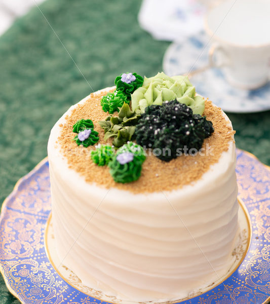 Close-up of Decorated Cake on Tea Party Table - Body Liberation Photos