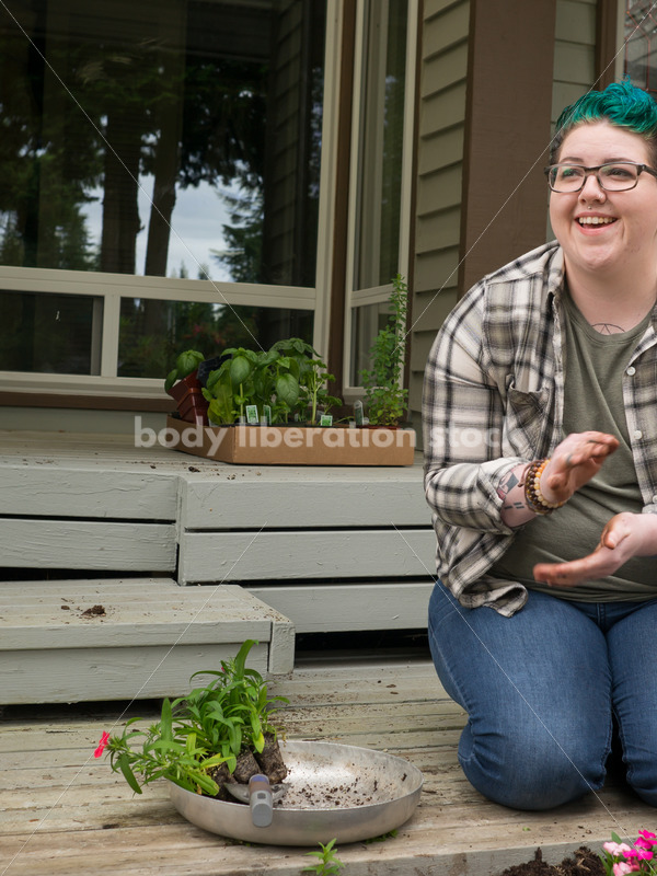 Diverse Gardening Stock Photo: Agender Person Brushes off Hands - Body Liberation Photos