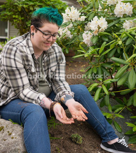 Diverse Gardening Stock Photo: Agender Person Brushes off Hands - Body Liberation Photos