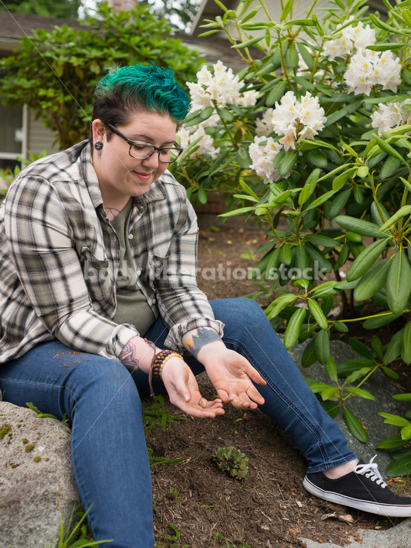 Diverse Gardening Stock Photo: Agender Person Brushes off Hands - Body Liberation Photos