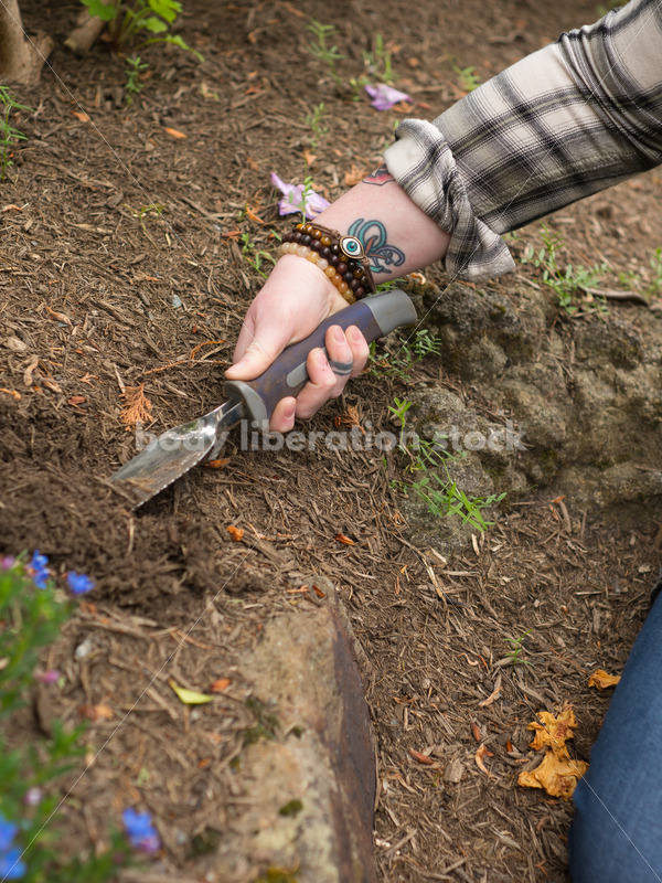 Diverse Gardening Stock Photo: Agender Person Digs with Trowel - Body Liberation Photos