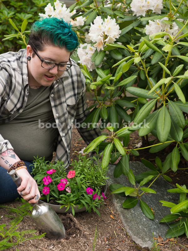 Diverse Gardening Stock Photo: Agender Person Digs with Trowel - Body Liberation Photos