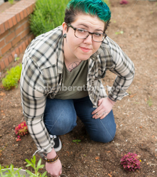 Diverse Gardening Stock Photo: Agender Person Digs with Trowel - Body Liberation Photos