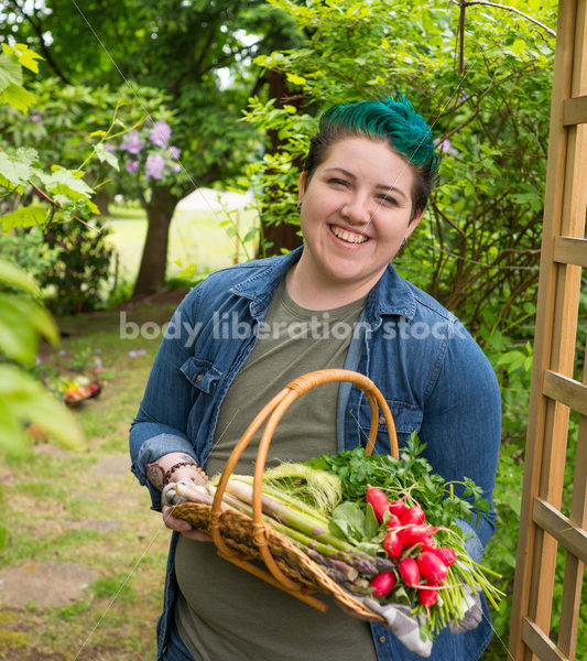 Diverse Gardening Stock Photo: Agender Person Holds Basket of Fresh Produce - Body Liberation Photos