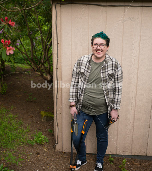 Diverse Gardening Stock Photo: Agender Person Holds Hand Tools - Body Liberation Photos