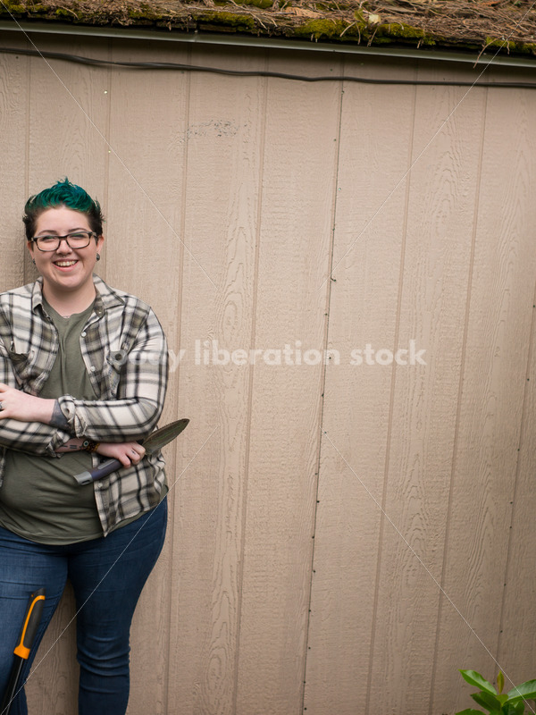 Diverse Gardening Stock Photo: Agender Person Holds Hand Tools - Body Liberation Photos