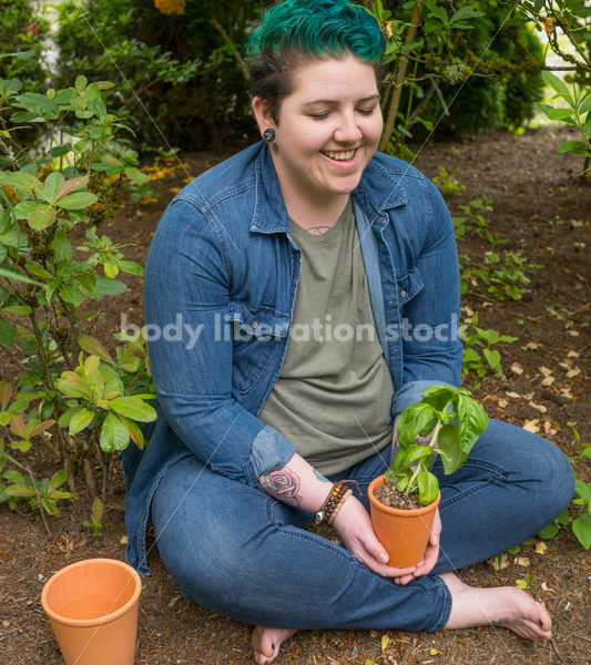 Diverse Gardening Stock Photo: Agender Person Meditates in Garden - Body Liberation Photos