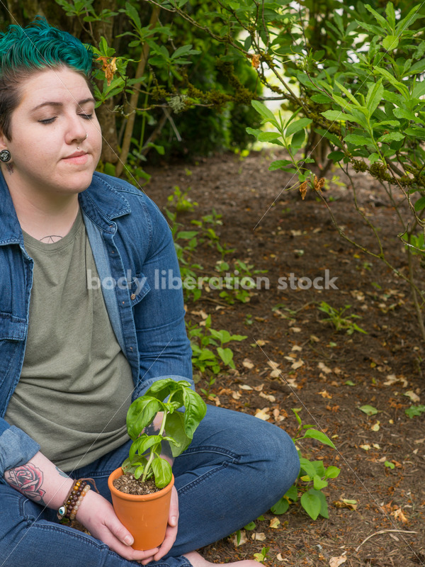 Diverse Gardening Stock Photo: Agender Person Meditates in Garden - Body Liberation Photos