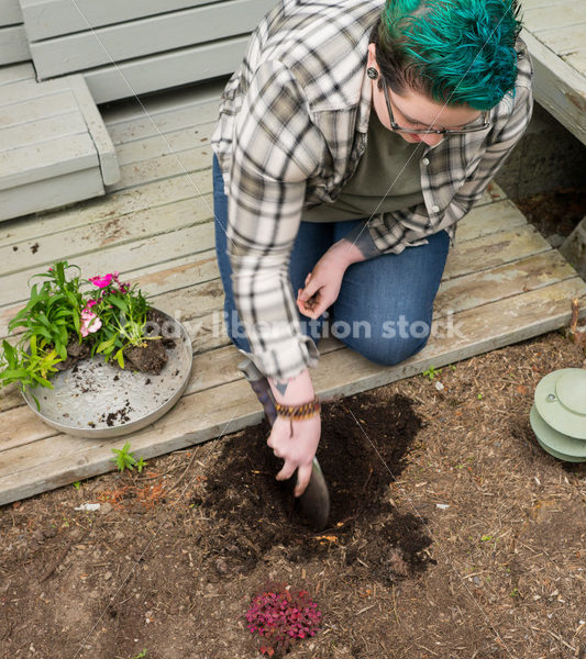 Diverse Gardening Stock Photo: Agender Person Plants Seedling - Body Liberation Photos